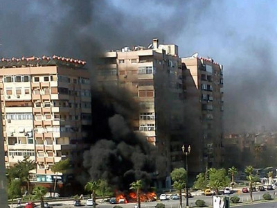 Two explosions hit Damascus, five security personnel reported killed