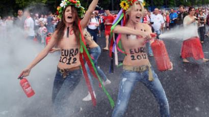 Members of Ukrainian feminist group Femen protests against prostitution near the National Stadium in Warsaw on June 8, 2012 (AFP Photo / Janek Skarzynski)