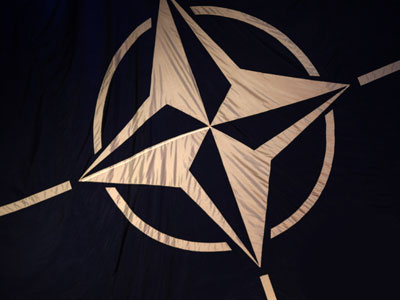 NATO's business strategy: No need to attack, just buy them up (Op-Ed)