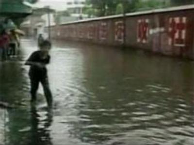 Floods and landslides kill 21 in China