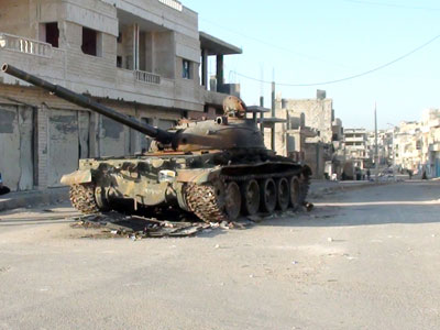 France warns of 'massive' response if Syria uses chemical weapons