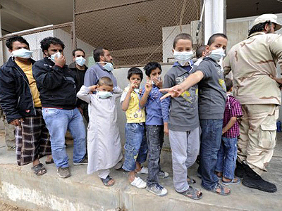 Gaddafi died from gunshot wound - autopsy
