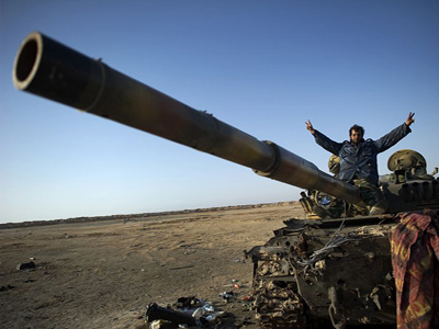 Who is helping Gaddafi out?