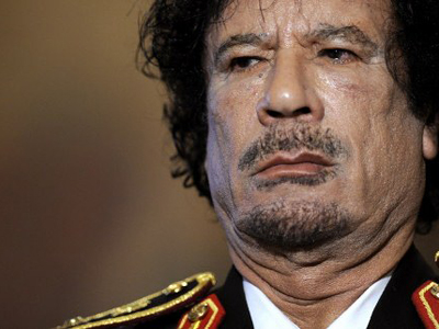 Gaddafi 'remains in Libya against all odds'