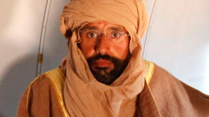 Seif al-Islam Gaddafi is pictured sitting in a plane in Zintan November 19, 2011 (Reuters/Ismail Zitouny)