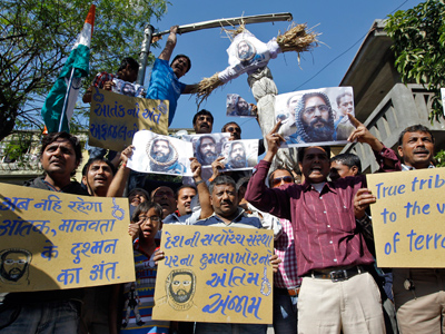 'Down with India': Protests over hanging of Kashmiri separatist turn violent (PHOTOS)