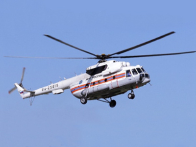 Investigators arrive at the scene of helicopter crash in Altay