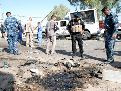 At least 33 killed in Iraq in wave of car bomb attacks