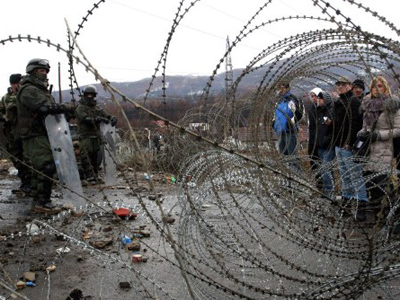 Kosovan Serbs to road-block border deal