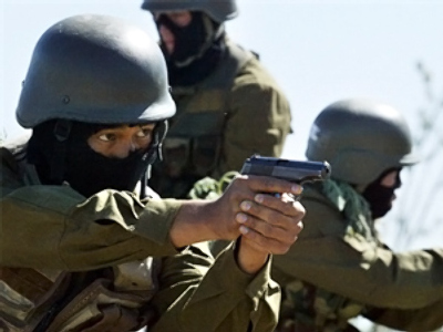 Kyrgyz police uncover US arms cache
