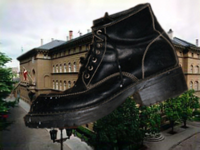 Latvians stage shoe-throwing protest