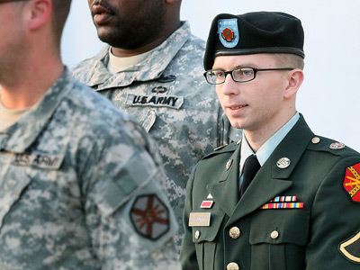 Manning trial set for February 2013, Assange expects to spend year in embassy