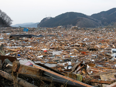 A general view shows the devastation as rescue workers search for victims in the rubble after the March 2011 magnitude 9.0 earthquake and tsunami in Rikuzentakata, northern Japan, March 13, 2011 (Reuters/Toru Hanai/Files)