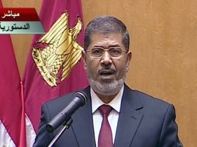 President Morsi hails 'new Egypt' but faces challenges to authority