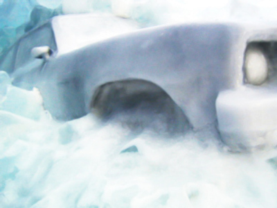 Moscow car crashes into icy pond
