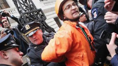 A protester is arrested by NYPD during an Occupy Wall Street "Shut Down the Corporations" protest on February 29, 2012 in New York City. (AFP Photo / Timothy A. Clary)