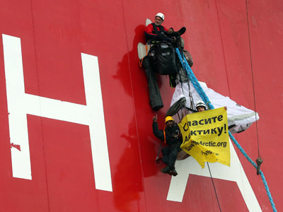 Greenpeace activists climb Russian Arctic oil rig to protest drilling