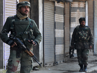 India and Pakistan trade accusations as cross-border raid kills 1 soldier