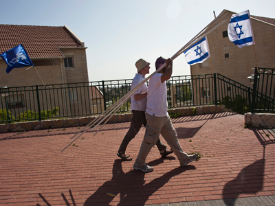 Despite internal debate, Israel stands ground on settlements