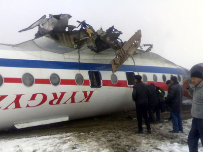 Cheating death: Passengers survive flipped over burning plane (PHOTOS)