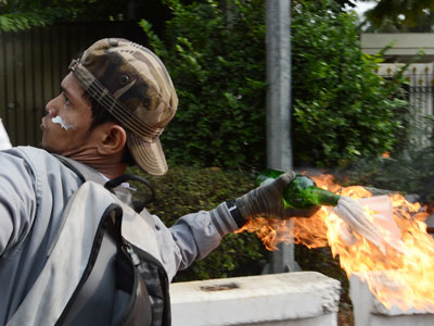 Indonesian police use tear gas to disperse anti-US protest
