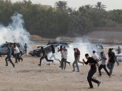 Bahraini protesters clash with police after rally ban