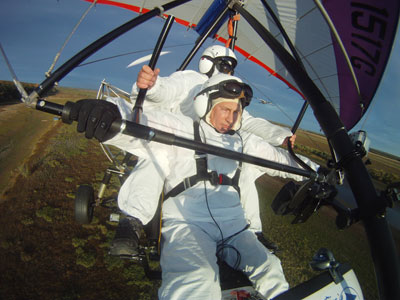 Putin rebuffs crane critics: 'Try to fly it yourselves'