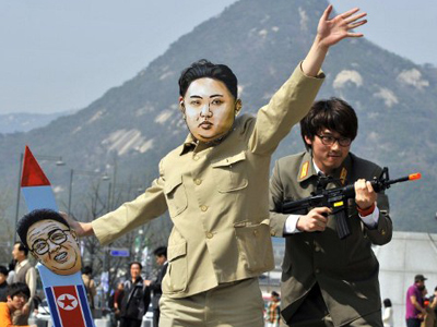 Koreas launch missile threats against each other