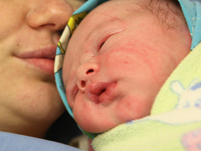 Delivery at 33,000ft: Passenger saves newborn's life mid-flight
