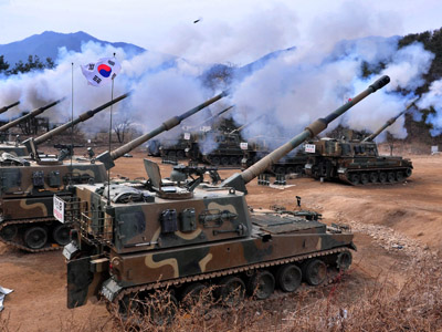 South Korea warns of tough military response to the North