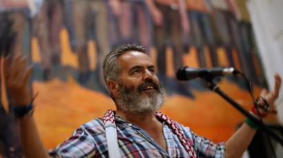 Marinaleda's Mayor and Izquierda Unida (IU) Parliamentarian Juan Manuel Sanchez Gordillo, 59, gestures as he speaks during a popular assembly in Marinaleda, southern Spain, August 15, 2012 (Reuters / Jon Nazca)