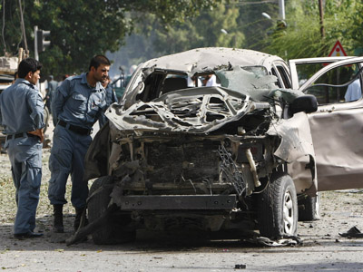 Twin suicide bombings in Afghanistan kill 14, wound over 60