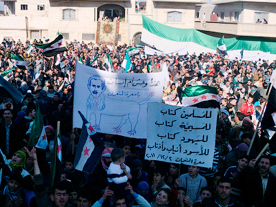 Syria succumbs to observer demands