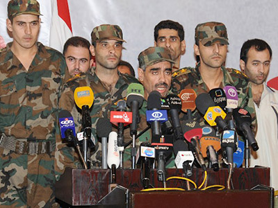 Syrian rebels defect to government forces