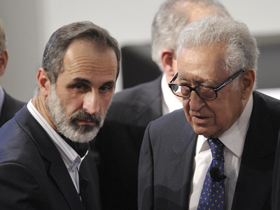 Sheikh Moaz Al-Khatib (left), head of the Syrian oposition talks with Lakhdar Brahimi, Joint Special Representative of the United Nations and the League of Arab States on Syria. (AFP Photo / Thomas Kienzle)