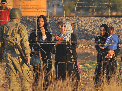 Fierce fighting on Turkish-Syrian border risks igniting broader conflict