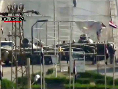 Syrian tanks storm town near Turkey despite pressure from Ankara