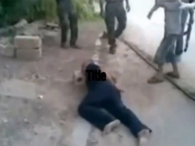 Grisly video allegedly shows Syrian rebels forcing child to behead unarmed prisoner