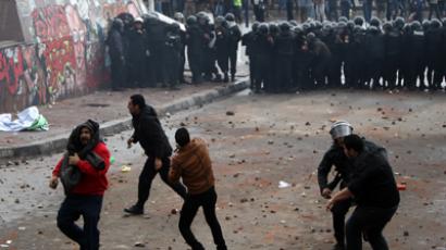 Egyptian riot police try to quell clashes between opponents and supporters of President Mohamed Morsi in the Mediterranean coastal city of Alexandria on December 21, 2012 (AFP Photo / Mahmud Hams) 