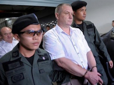 Charges dropped against arms plane crew in Thailand