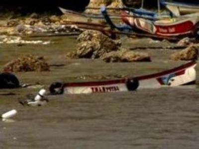 The dead are buried from Java’s ravaged coastline