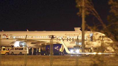 A Syrian passenger plane which was forced to land sits at Esenboga airport in Ankara October 10, 2012.  (Reuters/Cem Oksuz/Anadolu Agency)