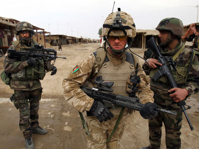 UK may speed troop pullout in 2013 over Marines shooting scandal