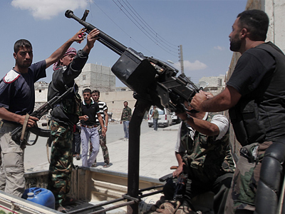 UK vows $7.8 mln to Syrian rebels, US readies more sanctions