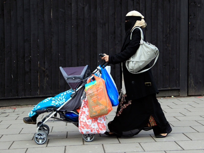 Muslim woman barred from school parents' event for wearing veil