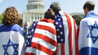 Flag-draped family at a rally at the Capitol in Washington, May 22, 2011 