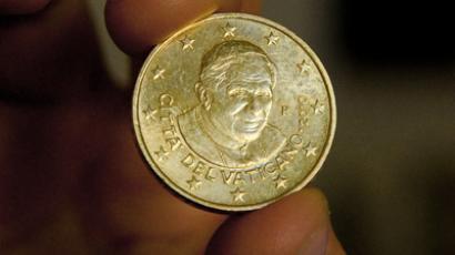 A 50-cent euro coin bearing the image of Pope Benedict XVI is pictured in Rome on July 22, 2010. (AFP Photo/Vincenzo Pinto)