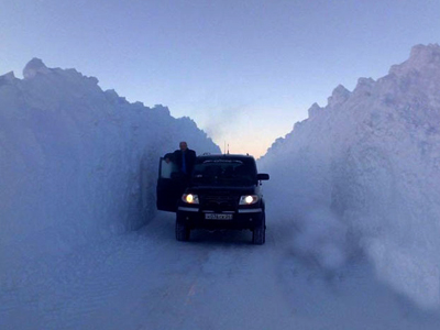 Snowpocalypse Russia: 'Snow tsunami' swallows streets, cars, buildings (PHOTOS)