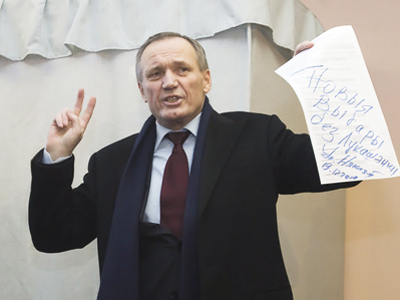 Belarusian authorities keep released opposition leader on short leash