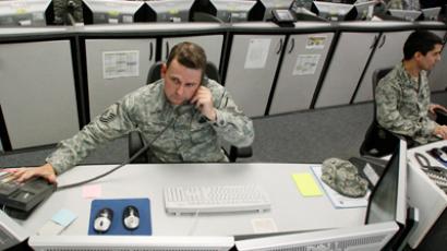 MSgt Michael Gregory, senior operations controller, works at the Air Force Space Command Network Operations & Security Center at Peterson Air Force Base in Colorado Springs, Colorado July 20, 2010. (Reuters / Rick Wilking)